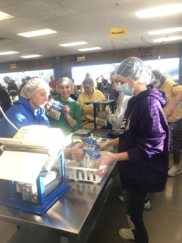 Students packing meals