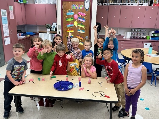Kindergarteners in Mrs. Flatin’s class worked on a STEM challenge to build an alien for the letter A that can stand with 3 legs and 4 cube blocks long.