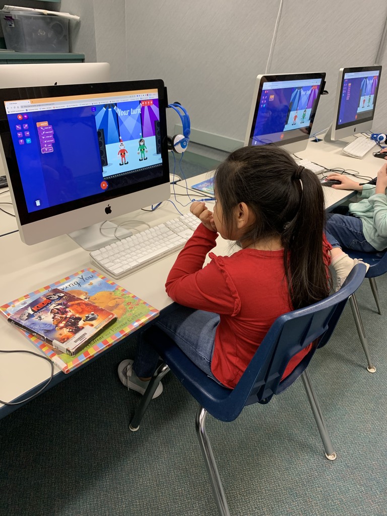 This week in the library media center, second graders were writing code to teach elves to dance. They practiced writing sequences and loops. Students showed determination to work on this challenging and fun task!