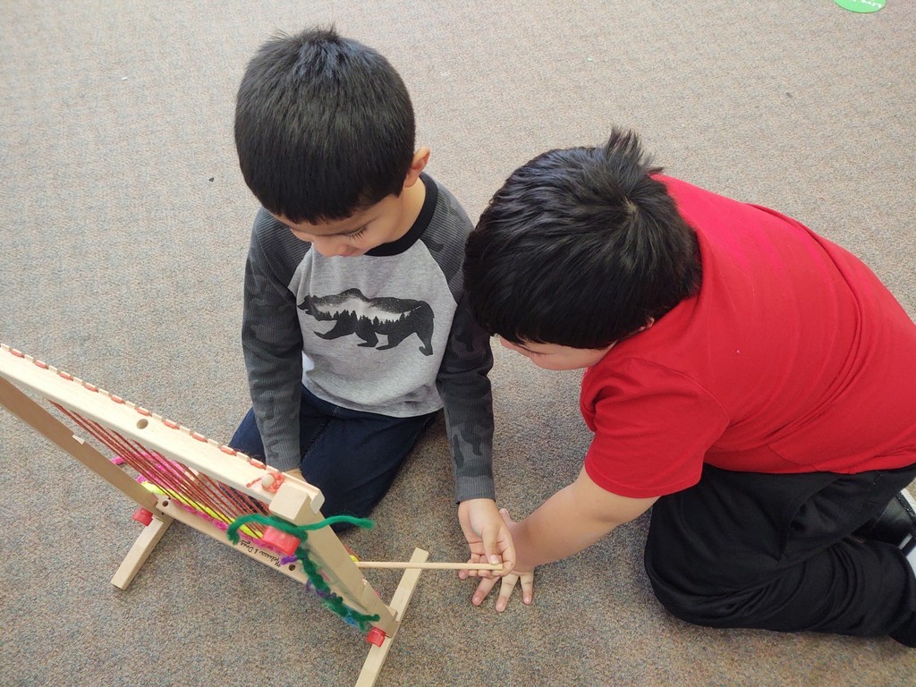 K & 1 exploring weaving with the table top loom.