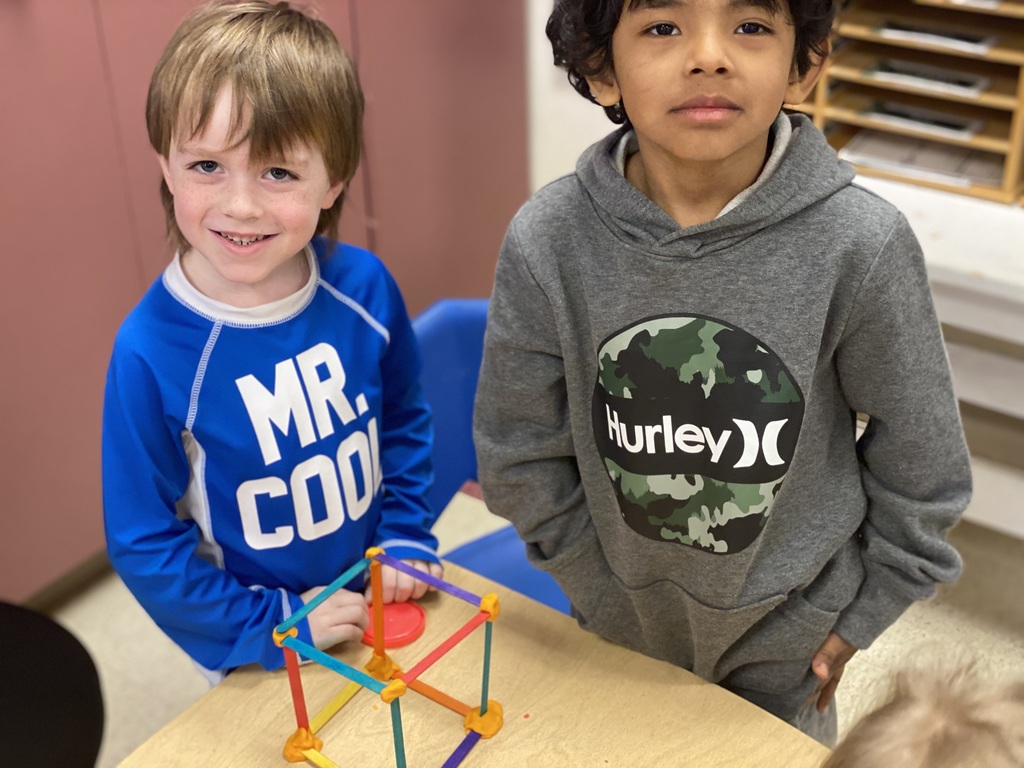Students are using Play-Doh and popsicle sticks to make 3-D shapes. They are learning about 2-D and 3-D shapes this month in math.